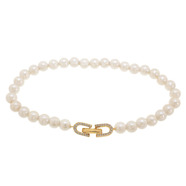 Necklace with mother-of-pearl and chain. Closure with zircons